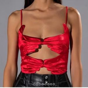 Red gloves shirt. Ties in the back